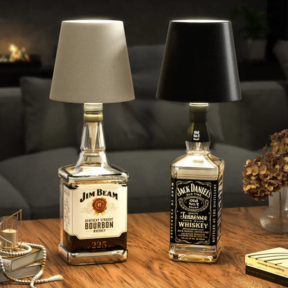 Empty AuraLite Wireless Bottle Lamp by Eclectic Essentials, rechargeable LED light inside a clear glass bottle.