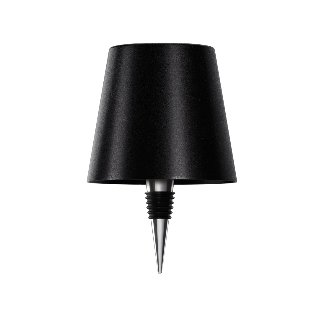 AuraLite wireless bottle lamp by Eclectic Essentials, rechargeable transparent black glass bottle with ambient lighting.