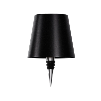 AuraLite wireless bottle lamp by Eclectic Essentials, rechargeable transparent black glass bottle with ambient lighting.