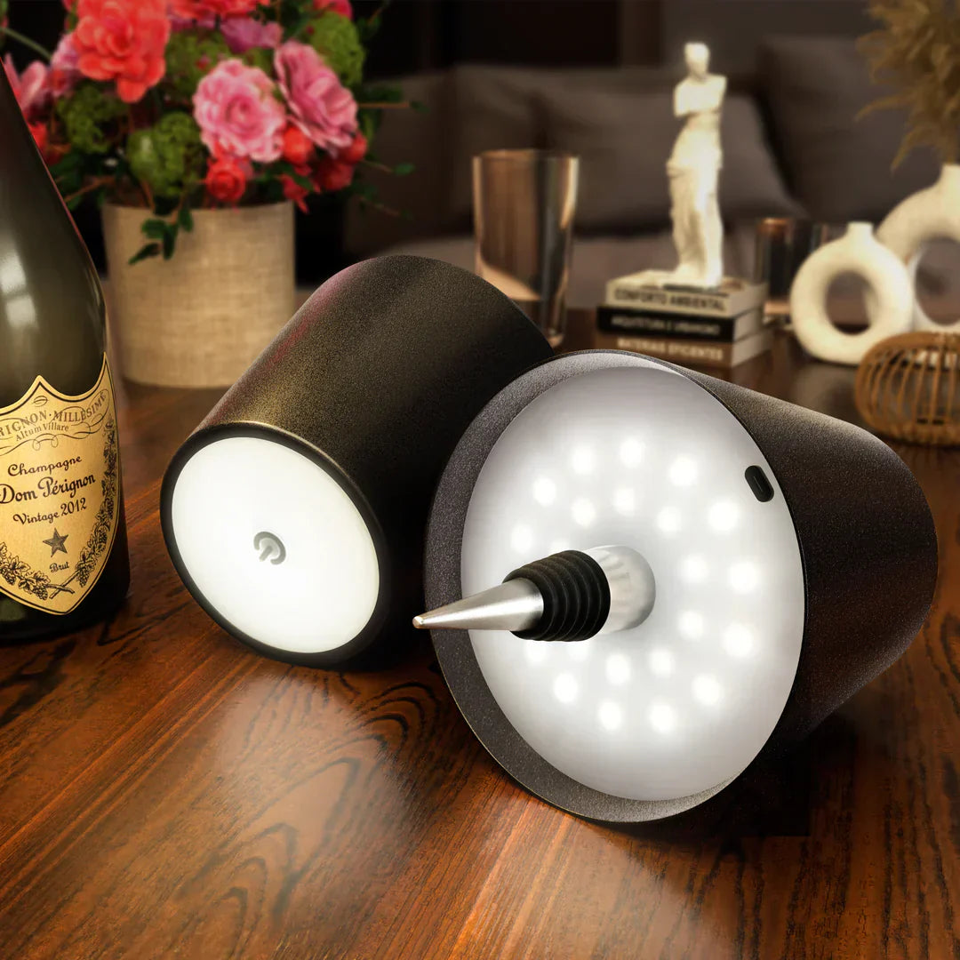 Eclectic Essentials AuraLite wireless rechargeable bottle lamp glowing softly, ideal for ambient lighting or decorative use.